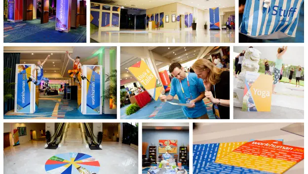 A collage of images showcasing various activities and displays at a Workhuman event. The photos include banners with the Workhuman logo, attendees engaging in activities, a colorful floor design with a wheel, and people participating in yoga. The setting appears to be a convention center or event space, emphasizing a dynamic and interactive atmosphere.
