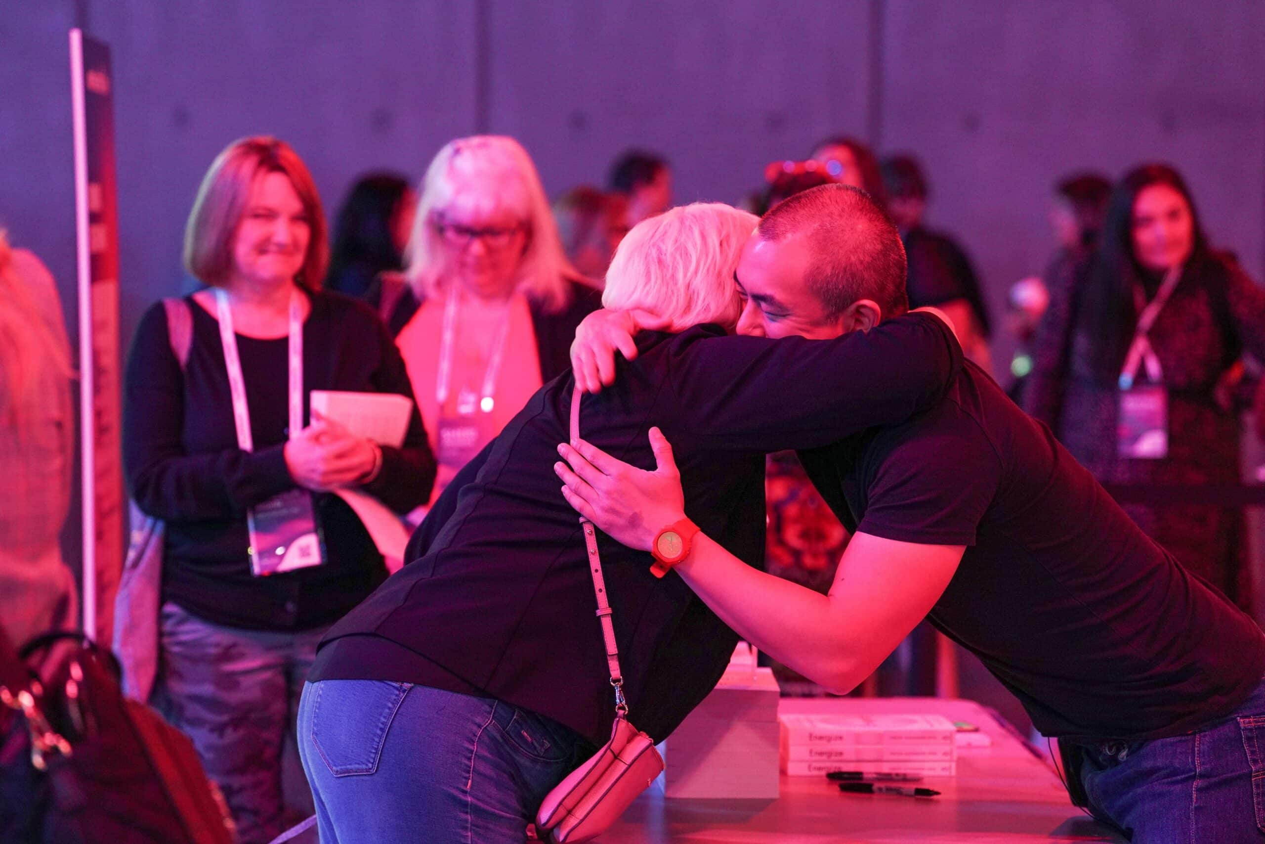 Hug at book signing